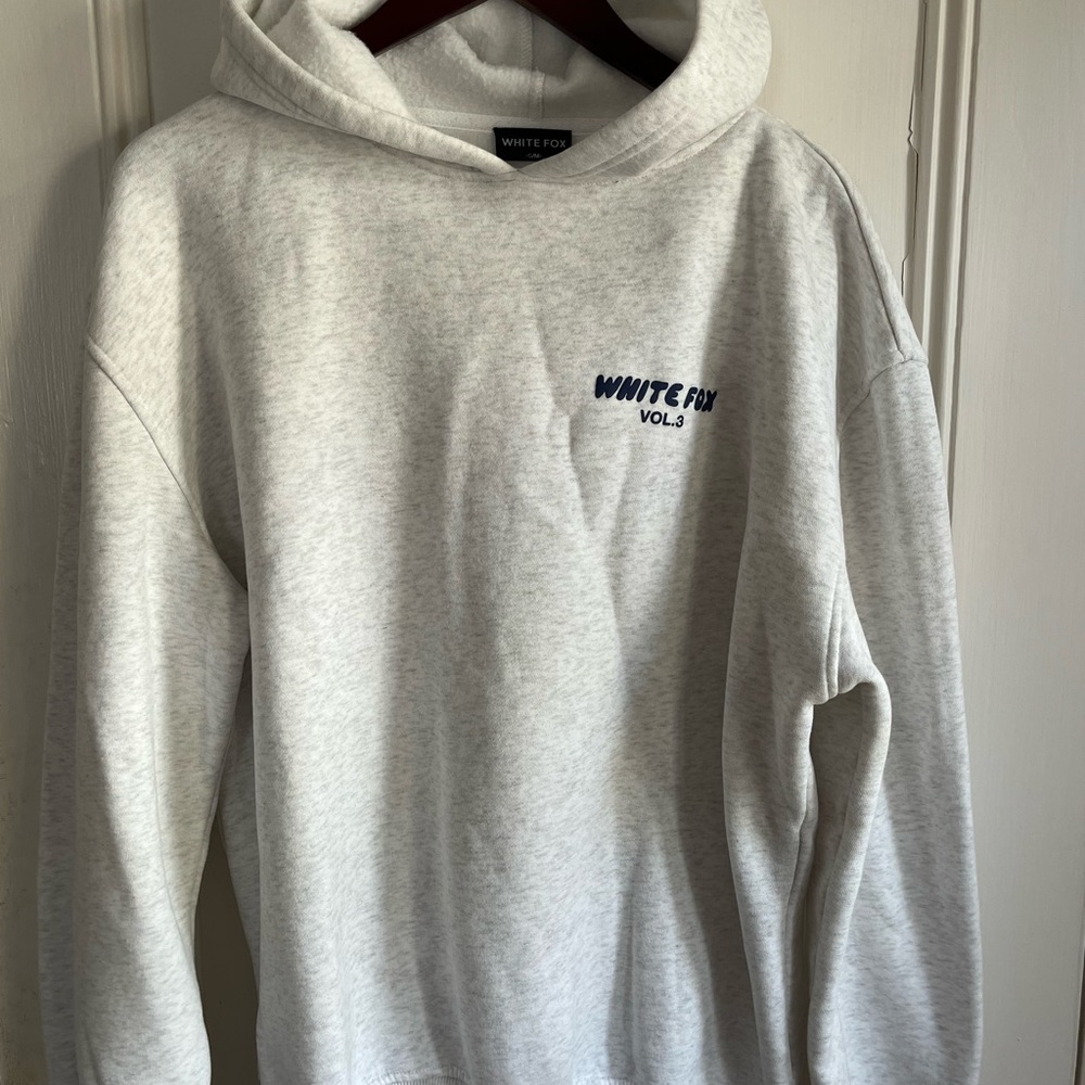 White Fox Boutique Cream Hoodie with Blue Logo